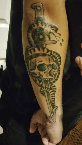 Explore ideas for matching couple tattoos, creative tattoo ideas in Anaheim, available at Mi Familia Tattoo Studio