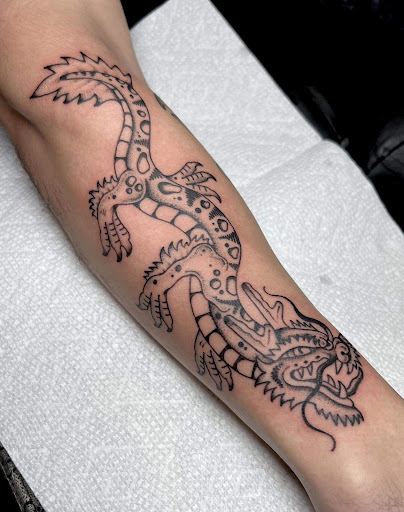 Explore front neck tattoo ideas, creative tattoo ideas in Rowlett, available at Fresh Image Tattoo Studios