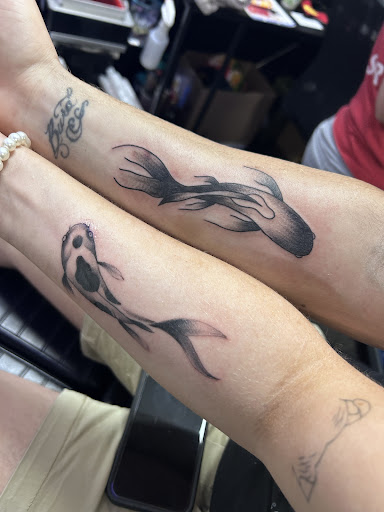 Explore big sis lil sis tattoo ideas, creative tattoo ideas in Pigeon Forge, available at Black Orchid Tattoo Studio