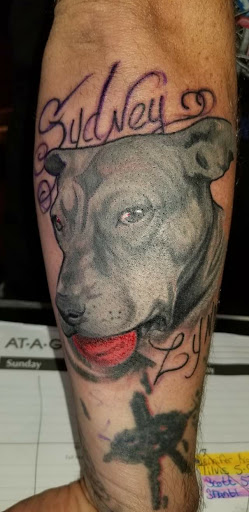 Explore portrait tattoo sleeve ideas, creative tattoo ideas in Angola, available at Hoodlum Ink