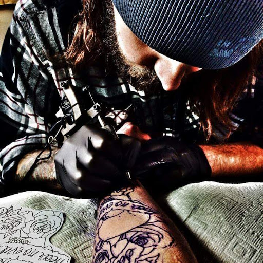 Explore 2x2 tattoo ideas for guys, creative tattoo ideas in Lander, available at Blackblood Tattoo and Piercing