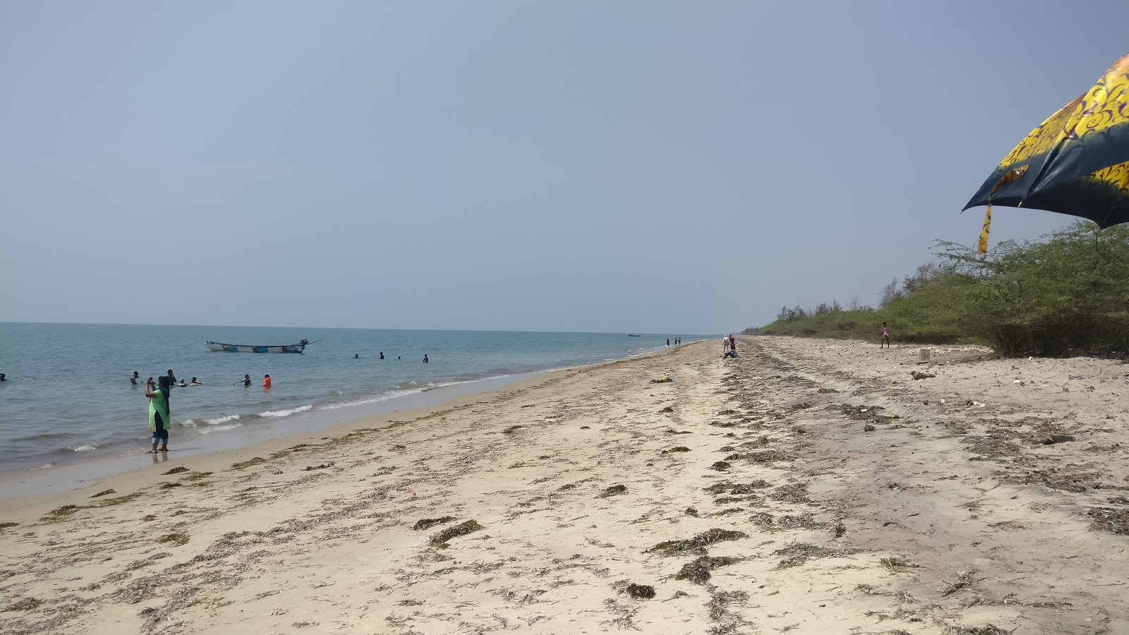 Foto von Sea Palm Beach mit beiger sand Oberfläche