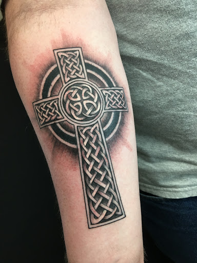Find tattoos with letters ideas for your next unique tattoo in Arlington at Benchmark Tattoos