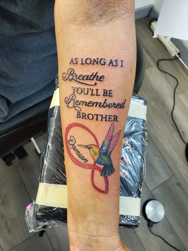 Explore neck tattoo ideas for woman, creative tattoo ideas in Danville, available at Studio Ink Tattoo and Body Piercing