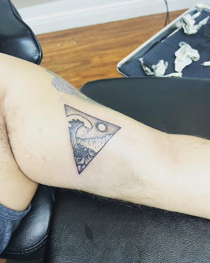 Explore hippy tattoo ideas, creative tattoo ideas in Cocoa, available at Rorschach Tattoo Shop and Piercing Studio