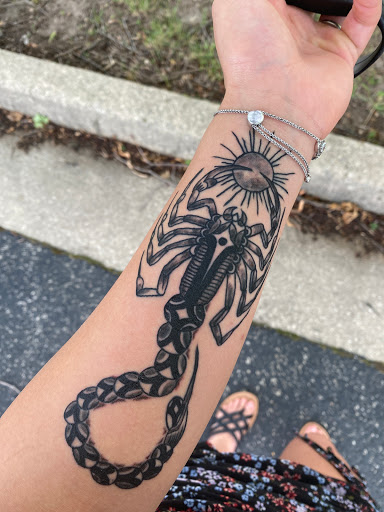 Find best dog tattoo ideas for your next unique tattoo in Rockford at House Of Pain Tattoo co.