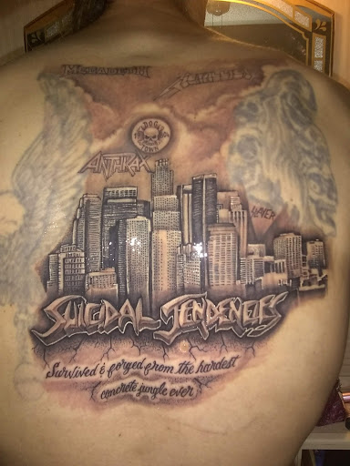 Explore rock tattoo ideas, creative tattoo ideas in Marietta, available at Royal Ink Studio