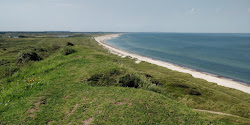 Gronne Beach'in fotoğrafı düz ve uzun ile birlikte