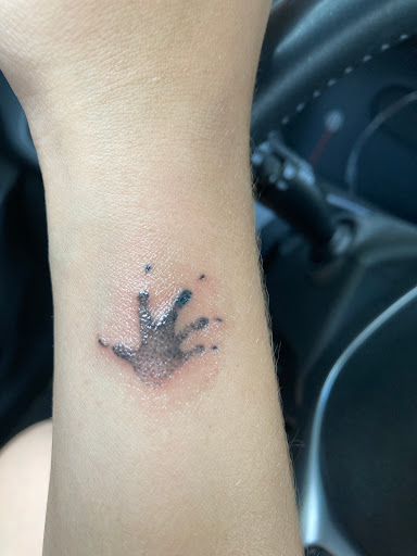 Explore tiger lily tattoo ideas, creative tattoo ideas in Olney, available at RAW INK Studio