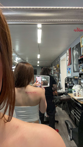 Explore 2003 tattoo ideas, creative tattoo ideas in Arlington, available at Urbans Tattoo & Piercing Studio South