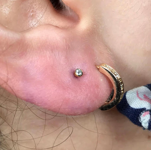 Explore tattoo ideas for back of the neck, creative tattoo ideas in Miami, available at Tattoos by Lou Miami - Kendall