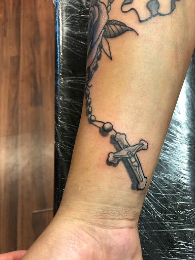Explore small travel tattoo ideas, creative tattoo ideas in Alamosa, available at The Shop Tattoo & Comics