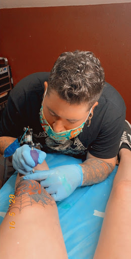 Tattoo Shop «Devine Designs Tattoo Emporium», reviews and photos, 1524 Porter Wagoner Blvd, West Plains, MO 65775, USA