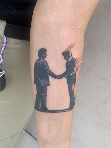 Explore love and war tattoo ideas, creative tattoo ideas in Albuquerque, available at Holy Fool Tattoo Club