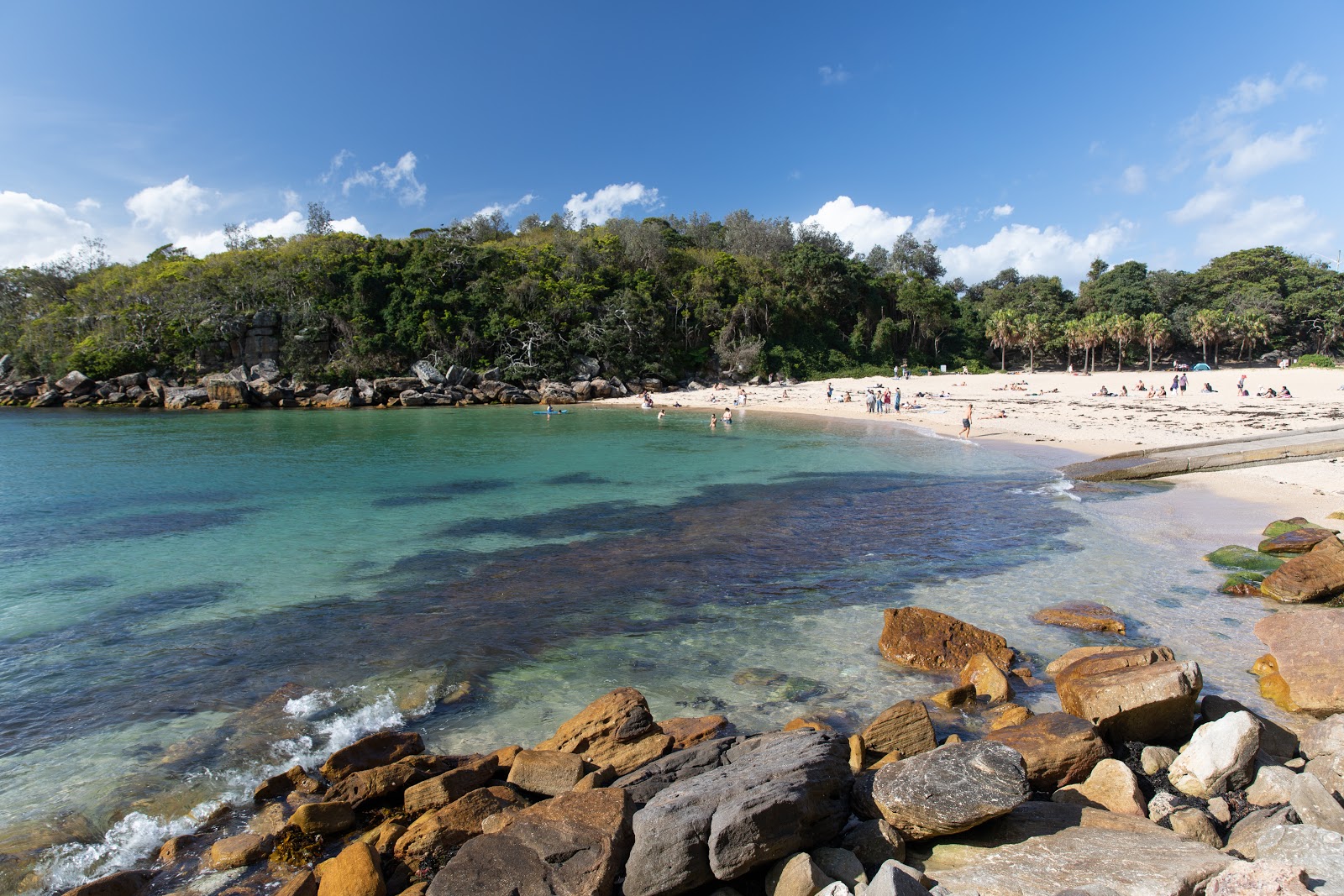 Foto de Shelly Beach con arena beige superficie