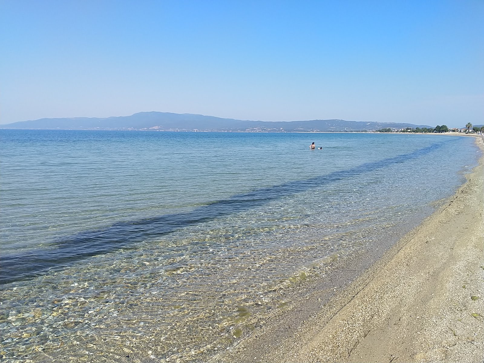Fotografija Paralia Ofriniou z beli pesek površino