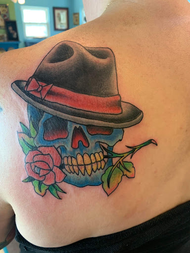 Explore world traveler tattoo ideas, creative tattoo ideas in Powell, available at Hummingbird Tattoo Studio