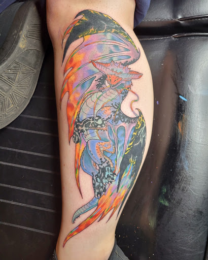 Explore cover up neck tattoo ideas, creative tattoo ideas in Moberly, available at The Gilded Lily Tattoo and Piercing