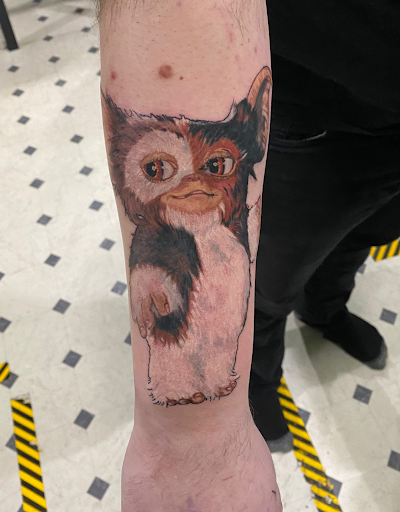 Explore back of neck tattoo cover up ideas, creative tattoo ideas in Evansville, available at Ink Therapy 101