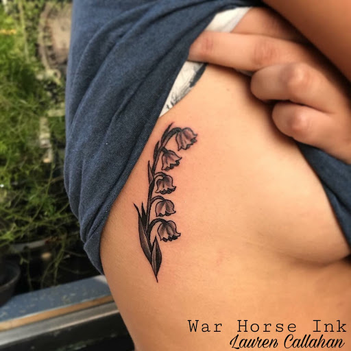 Explore charm tattoo ideas, creative tattoo ideas in Kent, available at War Horse Ink