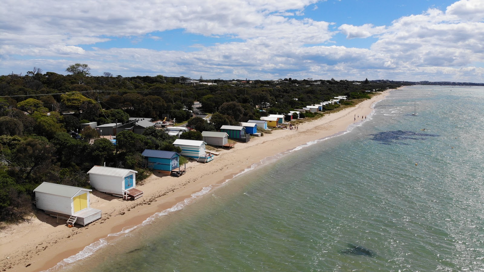 Foto de Tyrone Beach com areia bege superfície