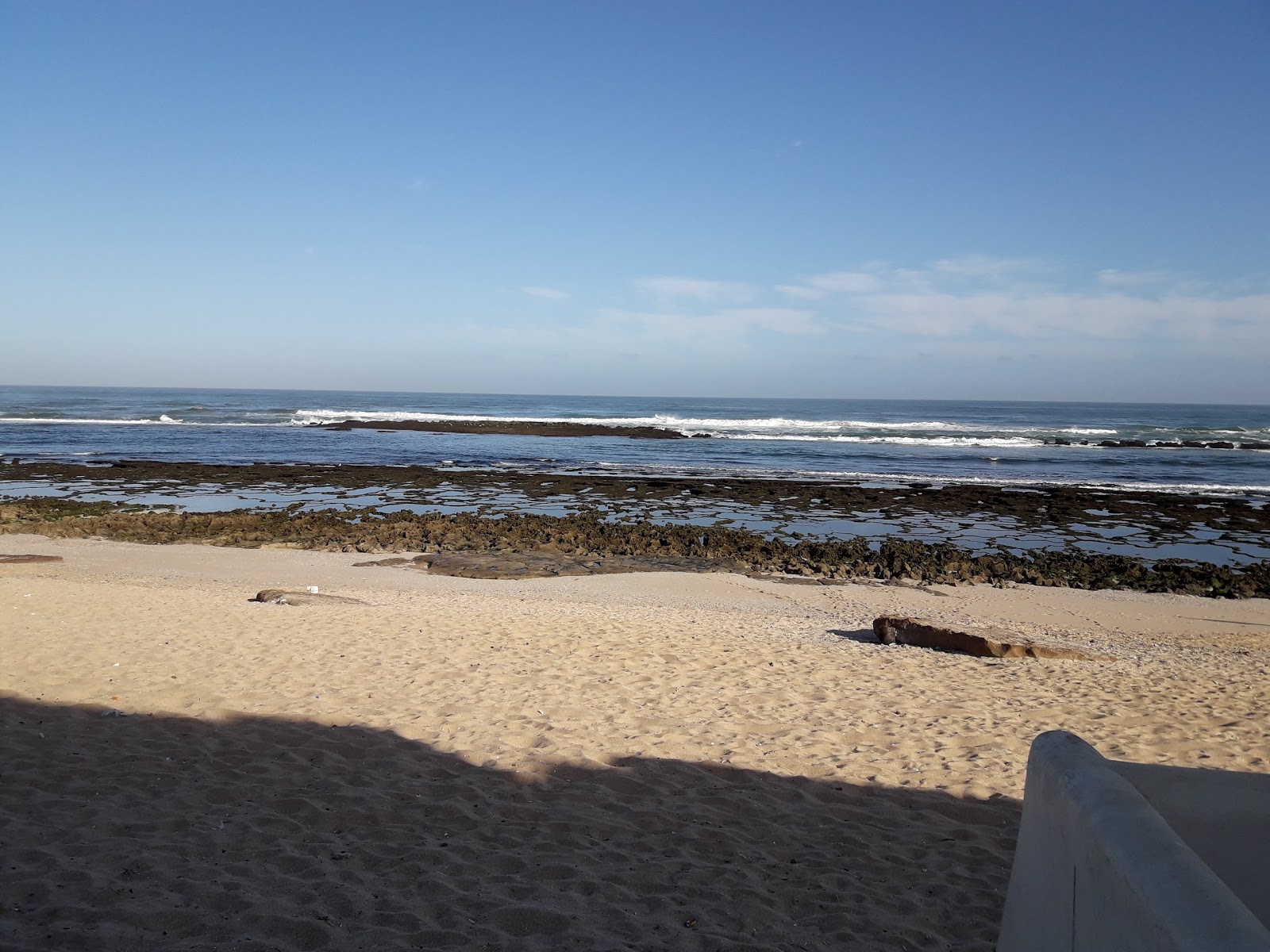 Foto van Plage Guy ville met gemiddeld niveau van netheid