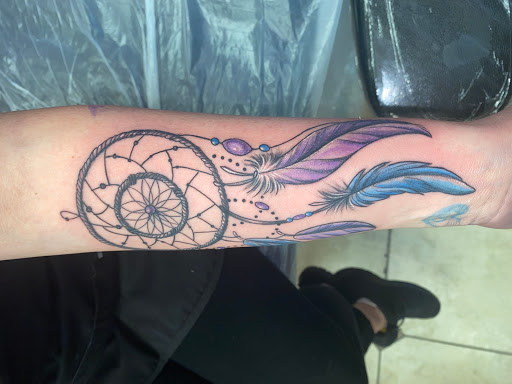 Explore divergent tattoo ideas, creative tattoo ideas in Katy, available at Artistic Impressions Tattoo Studio