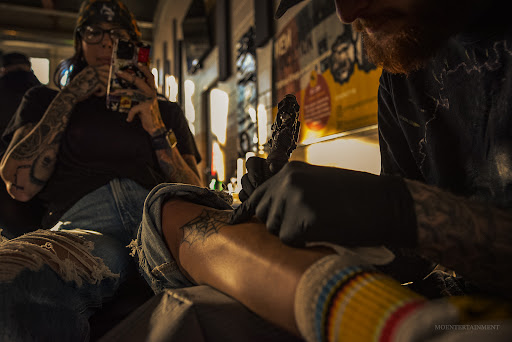 Explore lower back cover up tattoo ideas, creative tattoo ideas in Springfield, available at Triumph Tattoo