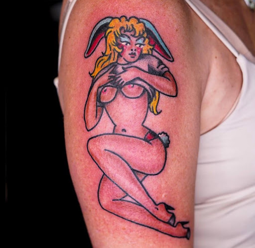 Explore tiger lily tattoo ideas, creative tattoo ideas in Springfield, available at Good Heart Tattoos