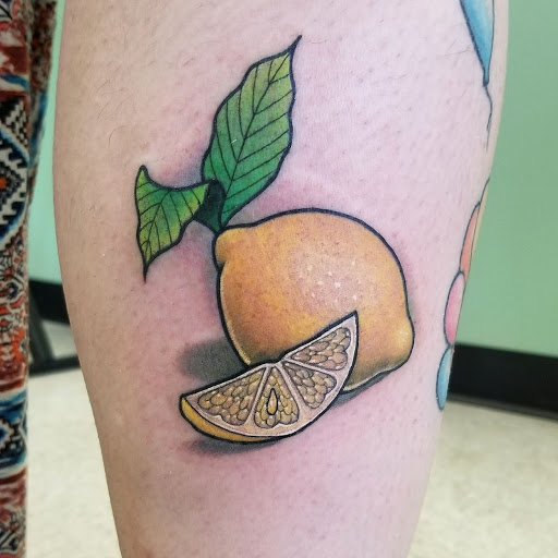 Explore trapezius tattoo ideas, creative tattoo ideas in East Greenbush, available at Bloodmoon Collective Tattoo & Fine Art