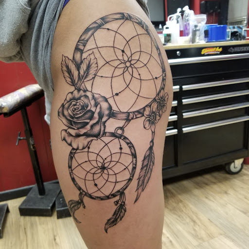 Explore knee scar tattoo ideas, creative tattoo ideas in Edinboro, available at No Regrets Tattoo (Appointment Only)