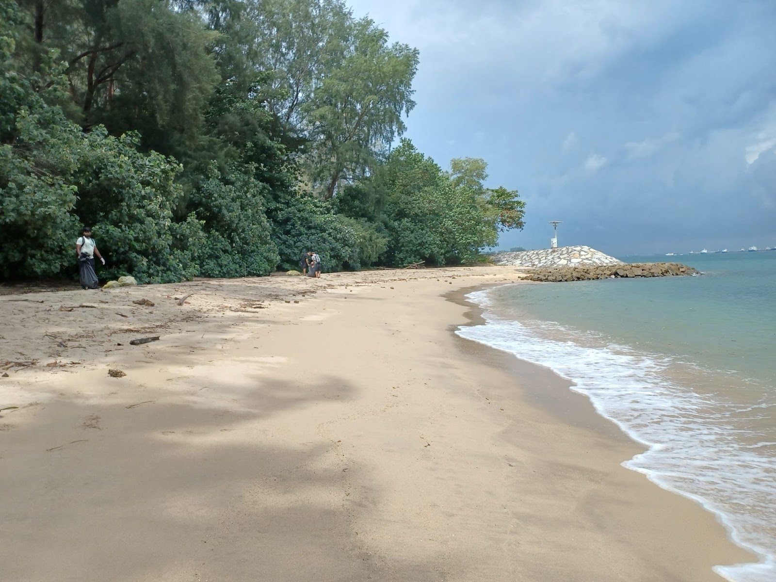 Φωτογραφία του NSRCC Beach με καθαρό νερό επιφάνεια