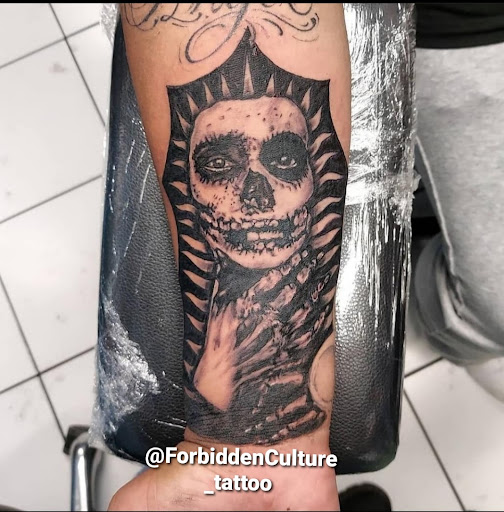 Explore behind ear tattoo ideas, creative tattoo ideas in Reseda, available at Forbidden Culture Tattoo Studio