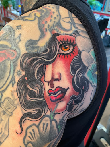 Explore chest tattoo lettering ideas, creative tattoo ideas in Georgetown, available at Iron Rite Tattoo South