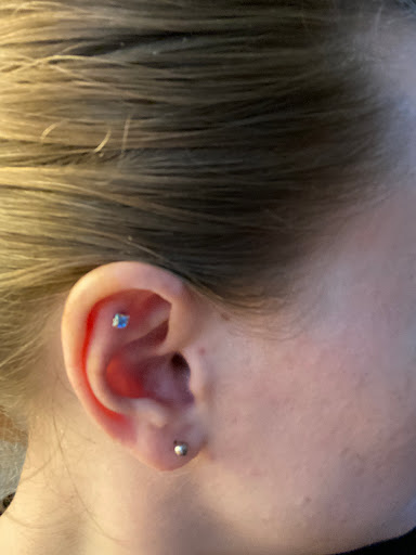 Find under the breast tattoo ideas for your next unique tattoo in Portland at Skin City Tattoo and Body Piercing