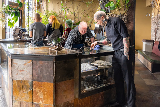 Explore family tree tattoo ideas for females, creative tattoo ideas in Albuquerque, available at Evolution Body Piercing