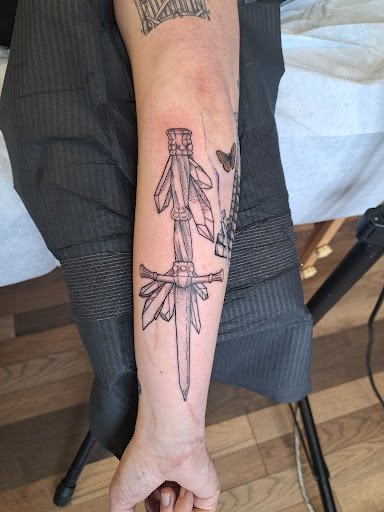 Explore wrist cross tattoo ideas, creative tattoo ideas in Idaho Falls, available at La Belladonna Tattoo Parlor
