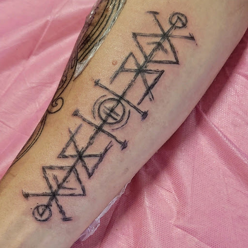 Explore tattoo ideas for teachers, creative tattoo ideas in Carbondale, available at Bonedale Tattoo