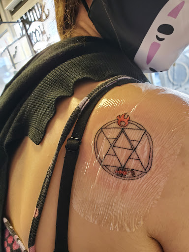 Explore 2 dog tattoo ideas, creative tattoo ideas in Anaheim, available at Autumn Moon Tattoo