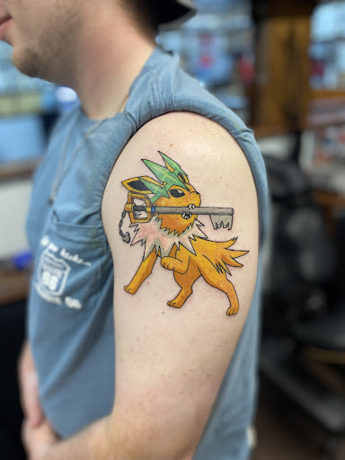 Explore black out tattoo ideas, creative tattoo ideas in Ocala, available at Beauty in a Canvas Tattoo and Art Gallery