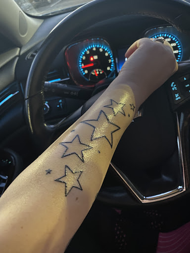 Explore daughter tattoo ideas for men, creative tattoo ideas in Boaz, available at Skin Deep Tattoo & Piercing Studio