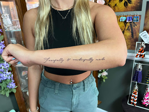 Explore small alien tattoo ideas, creative tattoo ideas in Vincennes, available at Silver Owl Tattoo