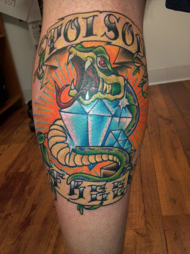 Find small cat tattoo ideas for your next unique tattoo in East Lansing at Splash of Color Tattoo & Piercing Studio