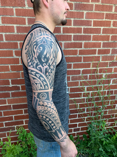 Explore coqui tattoo ideas, creative tattoo ideas in Strasburg, available at Champion Tattoo Company