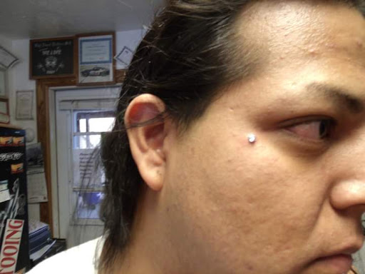 Explore 21st tattoo ideas, creative tattoo ideas in Elko, available at Custom Tattoos and Body Piercing Studio