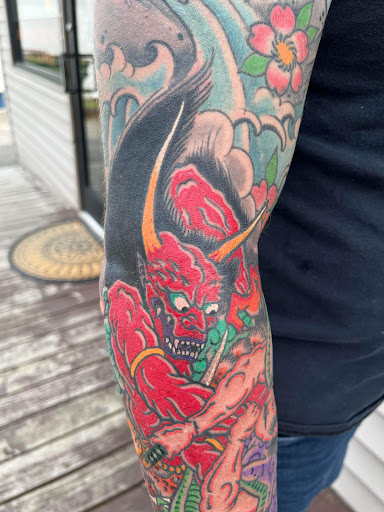 Explore tattoo ideas for a name cover up, creative tattoo ideas in Pikeville, available at Sacred Mountain Tattoo