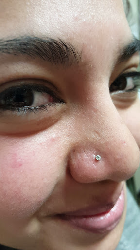 Explore name neck tattoo ideas, creative tattoo ideas in Aurora, available at Ronin Tattoo Studio INC