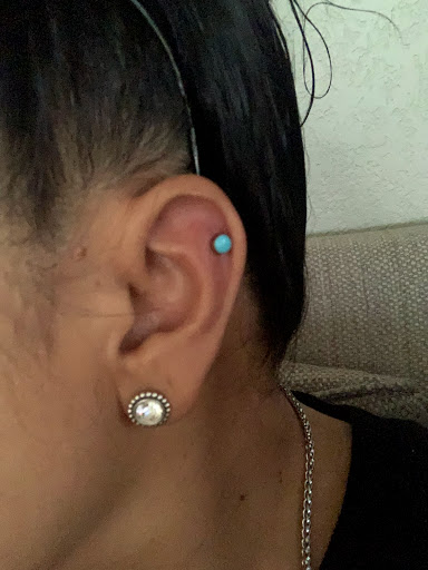 Explore cool chest tattoo ideas, creative tattoo ideas in Redding, available at Fetch Body Piercing