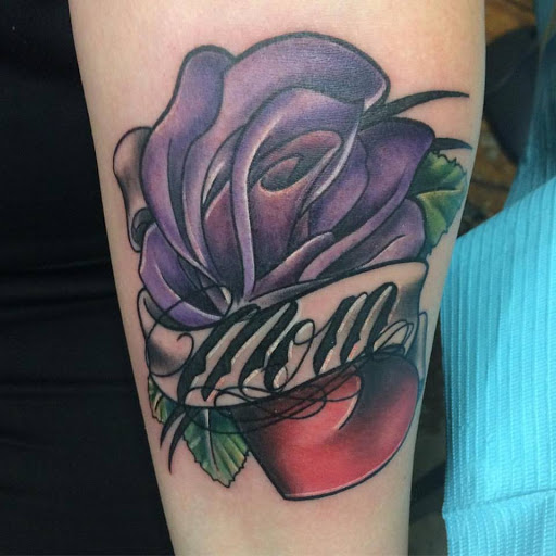 Explore black bear tattoo ideas, creative tattoo ideas in Chapel Hill, available at Golden Falcon Tattoo and Piercing