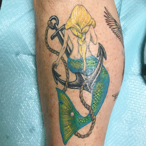 Explore dreaming tattoo ideas, creative tattoo ideas in Louisburg, available at Lewter Tattoos and Piercing